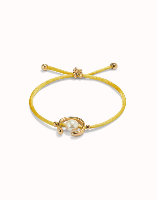 Pulsera de hilonamarillo con perla shell fornitura ba&ntilde;ada en oro 18k.